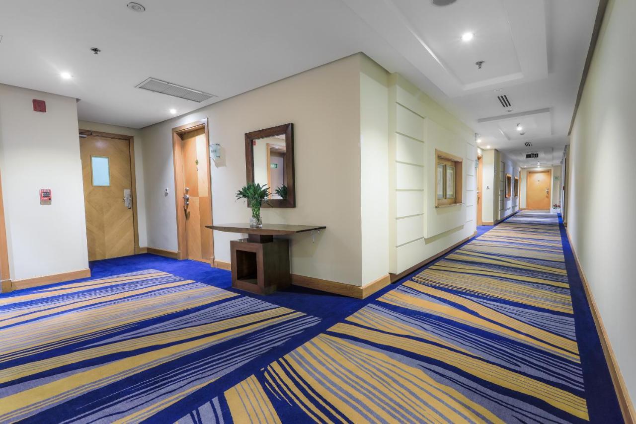 Elaf Al Mashaer Hotel Makkah Мекка Экстерьер фото A corridor in a modern hotel